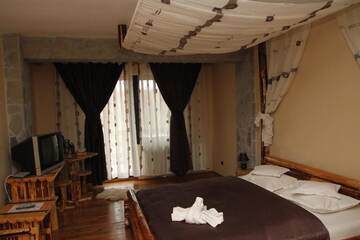 Фото номера Двухместный номер с 1 кроватью Загородные дома Casa Bradet г. Инторсура-Бузэулуй 10