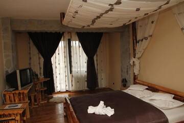 Фото номера Двухместный номер с 1 кроватью Загородные дома Casa Bradet г. Инторсура-Бузэулуй 3